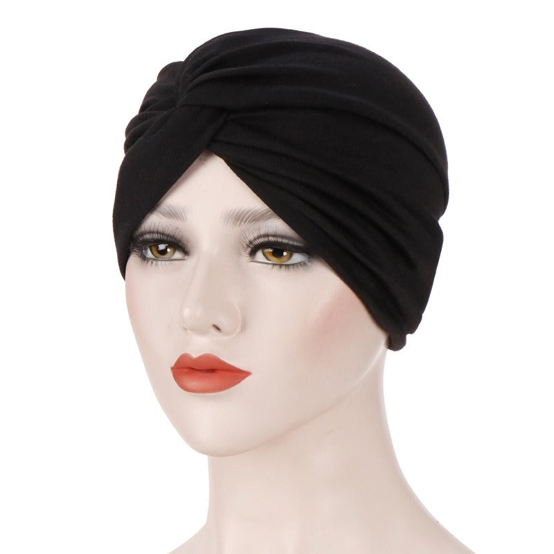 New elastic fabric with crossed candy colored twisted hat and candy colored base on the forehead